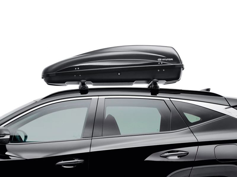 Extra bagage kun je met gemak kwijt in deze dakkoffer ‘Hyundai’ (330 of 390 liter inhoud).