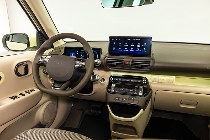 Onder het centrale touchscreen van de Hyundai INSTER vind je een prachtige verzameling van fysieke druk- en draaiknoppen.